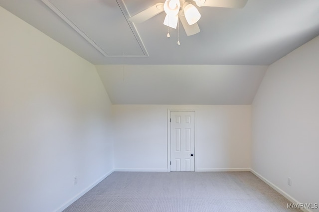 bonus room with vaulted ceiling, carpet floors, and ceiling fan