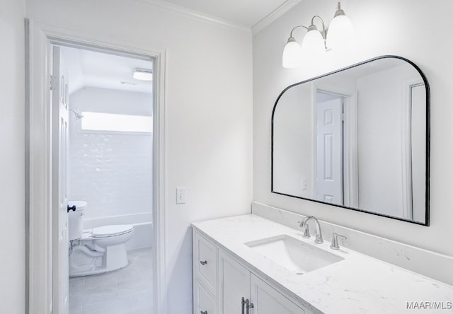 full bathroom featuring vanity, crown molding, bathing tub / shower combination, and toilet