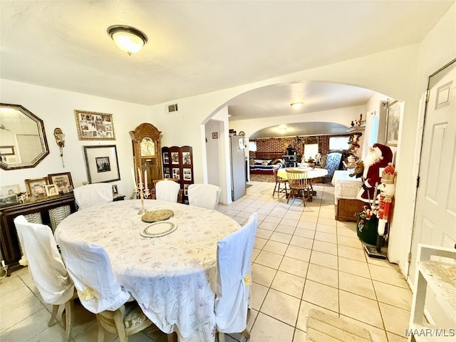 dining room with light tile patterned floors