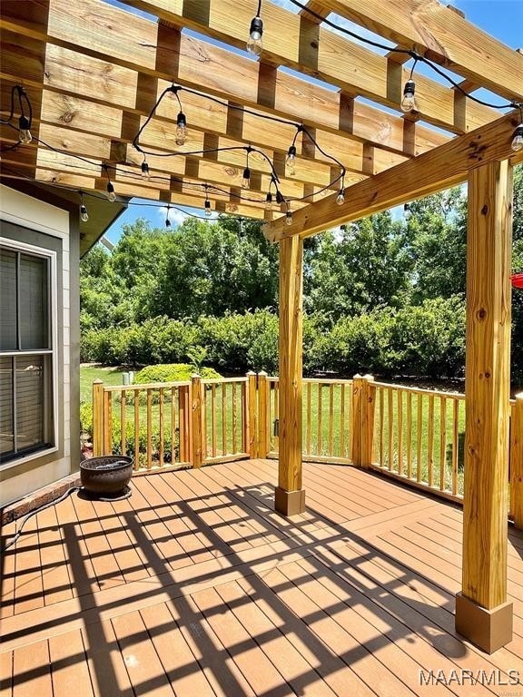 wooden deck featuring a pergola