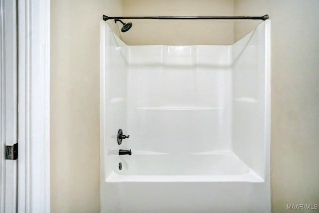 bathroom with shower / bathtub combination