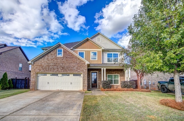 craftsman-style house featuring a front yard and a garage