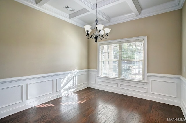 empty room featuring dark hardwood / wood-style floors, beam ceiling, ornamental molding, and an inviting chandelier