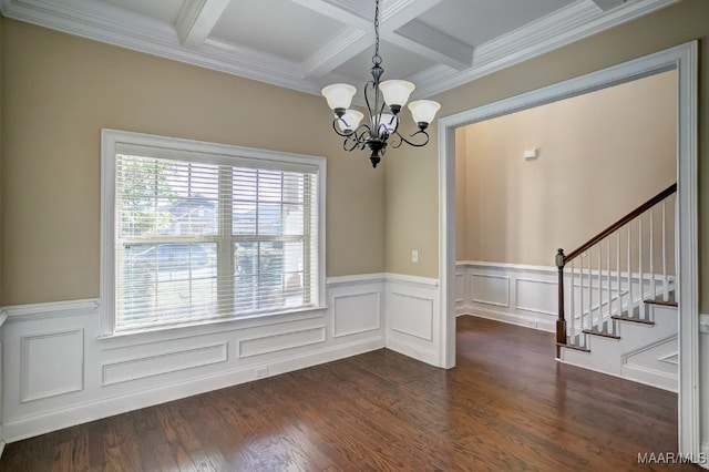 unfurnished dining area with beam ceiling, a wealth of natural light, dark hardwood / wood-style floors, and an inviting chandelier