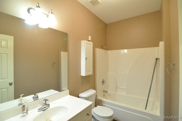 full bathroom featuring shower / washtub combination, vanity, and toilet