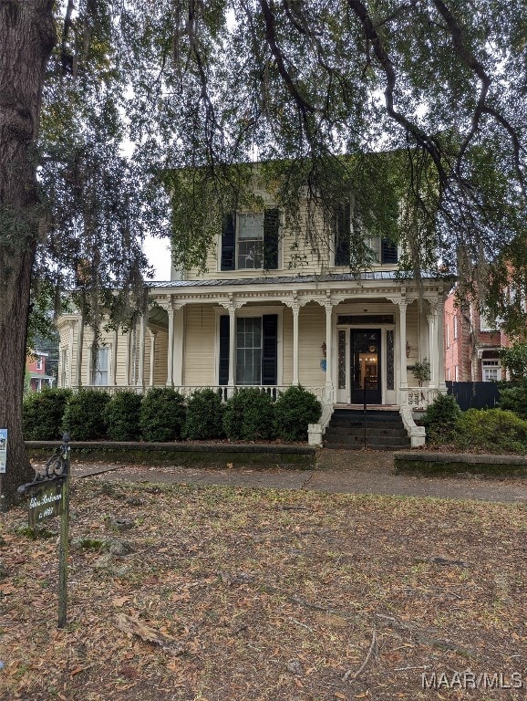 view of front of home featuring covered porch