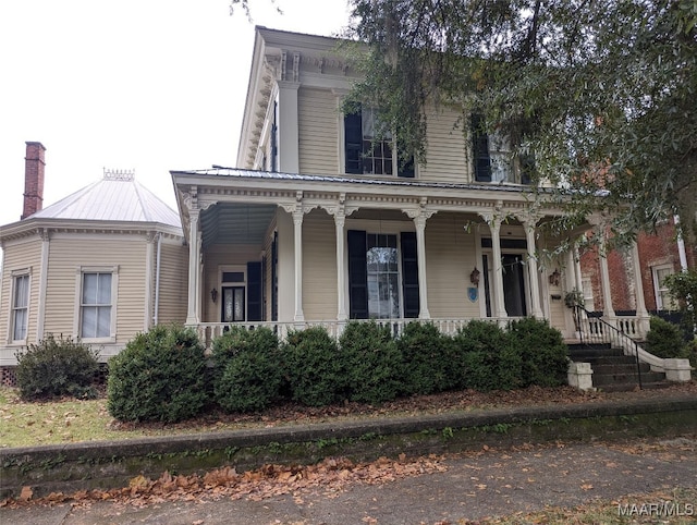 italianate home with covered porch