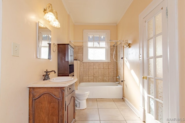 full bathroom with tiled shower / bath combo, tile patterned floors, toilet, vanity, and ornamental molding