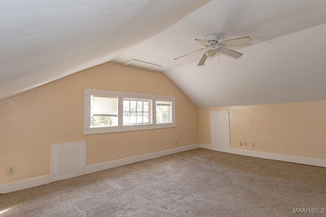 bonus room with carpet flooring, ceiling fan, and lofted ceiling