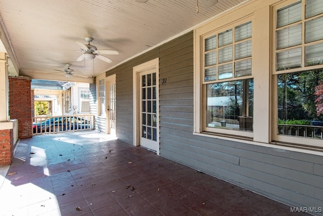 view of patio featuring ceiling fan