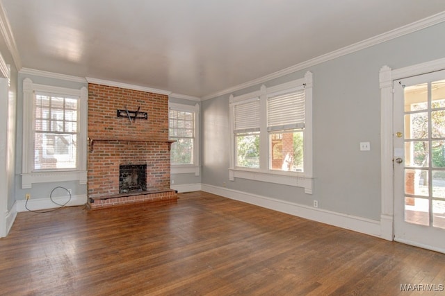 unfurnished living room featuring hardwood / wood-style floors and a healthy amount of sunlight