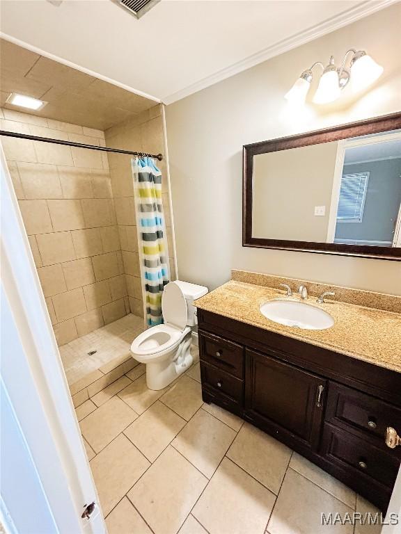103 Wilkins Rd, Selma, AL 36701 - full bath with vanity, tile patterned floors, a shower stall, and ornamental molding