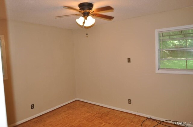 12 Pine St, Montgomery, AL 36110 - empty room with a ceiling fan and baseboards
