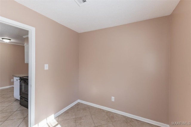 view of tiled spare room