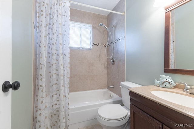 full bathroom with vanity, toilet, and shower / tub combo with curtain