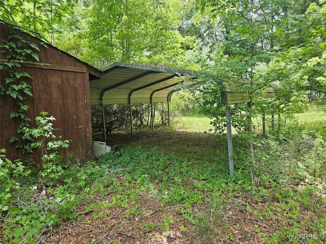 view of yard featuring a carport