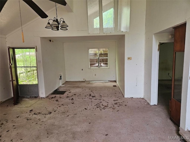 unfurnished living room with high vaulted ceiling and a chandelier