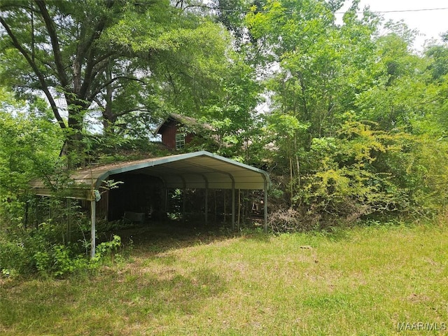 view of outdoor structure with a carport