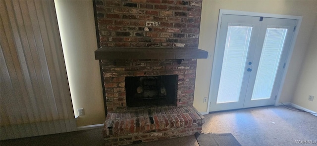 details featuring a fireplace, french doors, and carpet flooring