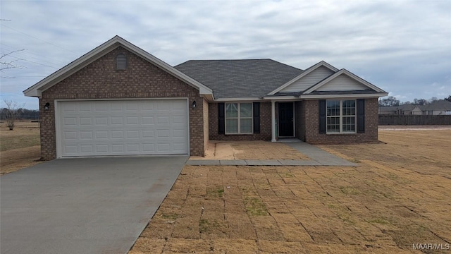 single story home with a garage