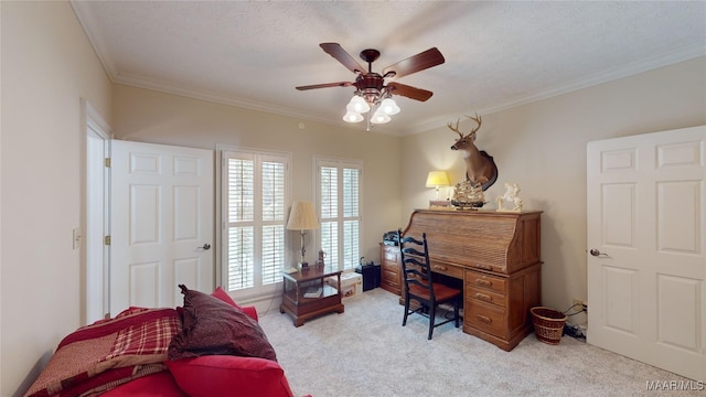 carpeted office featuring a textured ceiling, ceiling fan, and ornamental molding