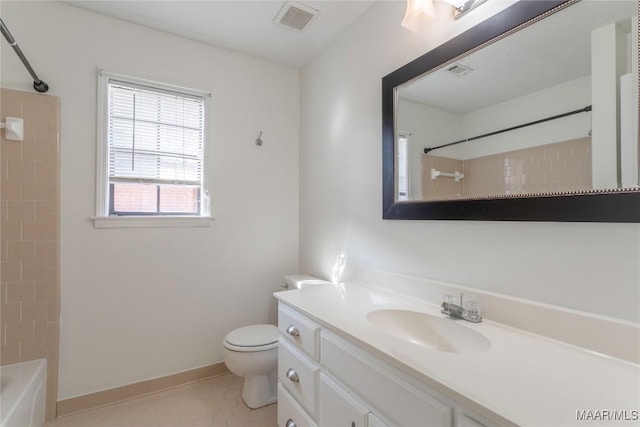 full bathroom with washtub / shower combination, vanity, toilet, and tile patterned flooring