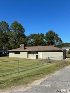 view of front of property with a front lawn