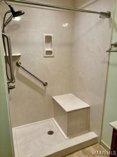 bathroom with vanity and walk in shower