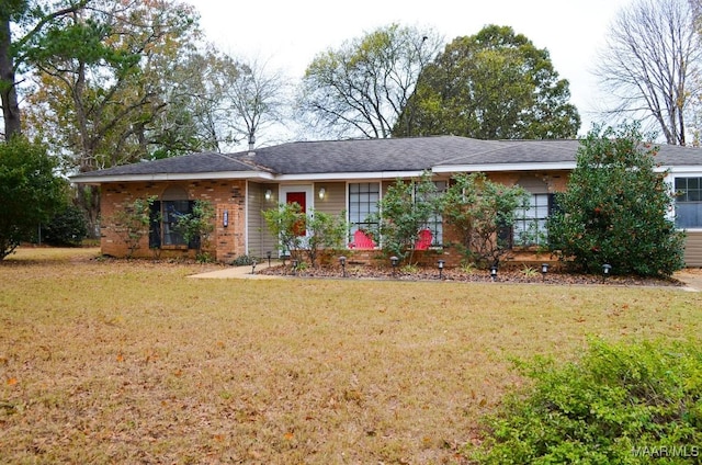 ranch-style house with a front yard