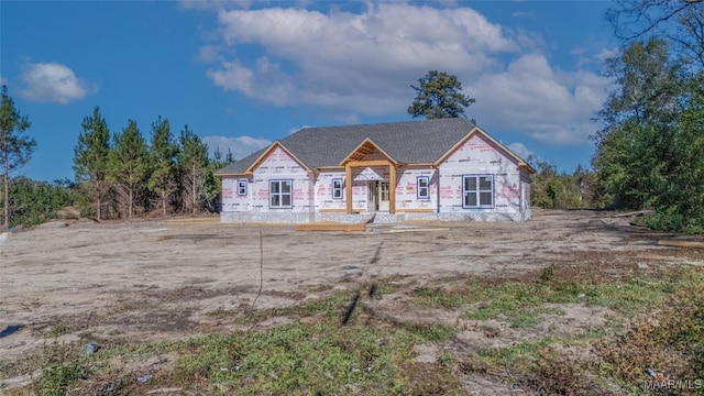 property in mid-construction featuring covered porch