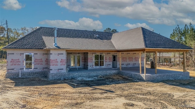 view of front of property featuring french doors and a patio