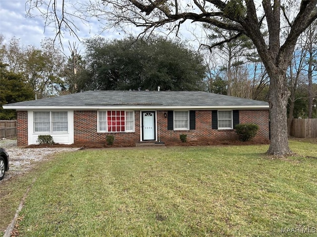 single story home featuring a front yard