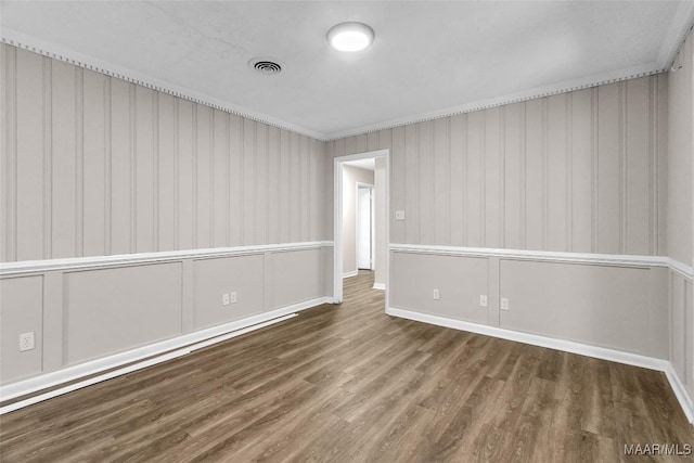 unfurnished room featuring dark hardwood / wood-style flooring