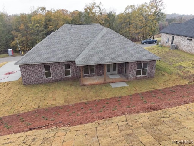 back of house with a patio area