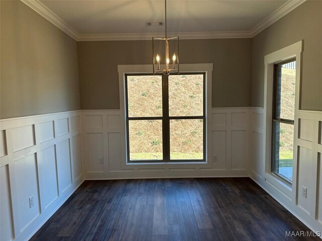 unfurnished dining area with dark wood-style floors, visible vents, a wealth of natural light, and an inviting chandelier