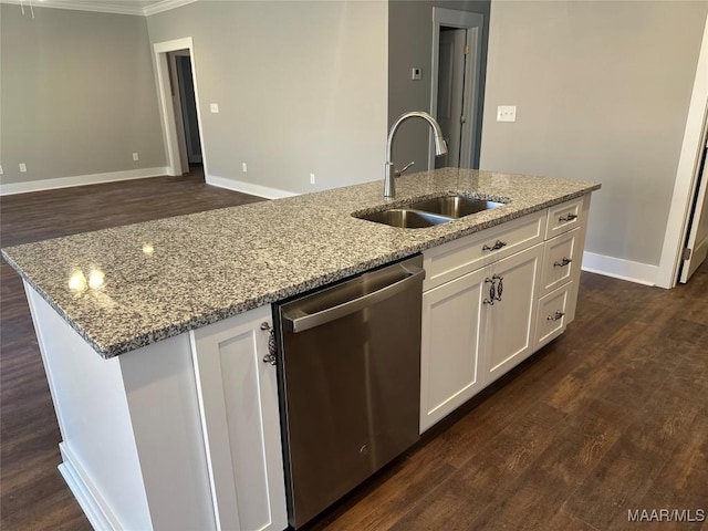 kitchen featuring stainless steel dishwasher, dark wood-type flooring, white cabinets, a kitchen island with sink, and a sink