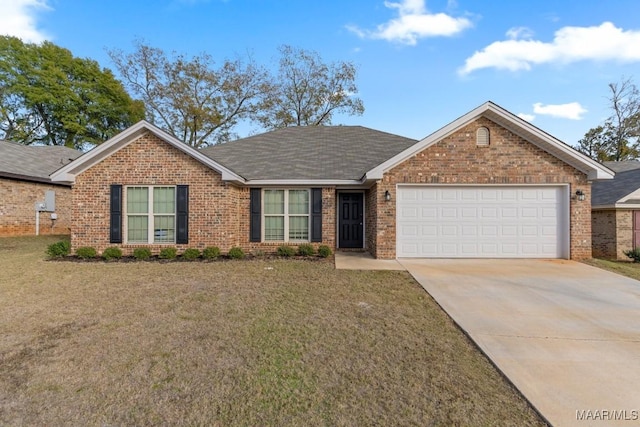 single story home with a garage and a front lawn