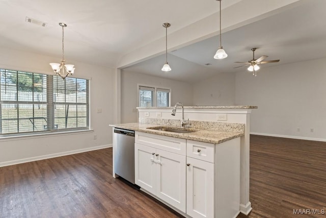 kitchen with white cabinetry, sink, lofted ceiling with beams, stainless steel dishwasher, and decorative light fixtures