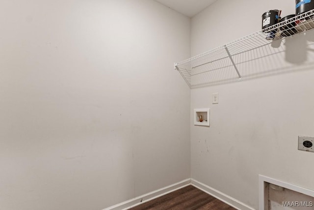 clothes washing area with hookup for an electric dryer, dark hardwood / wood-style flooring, and washer hookup