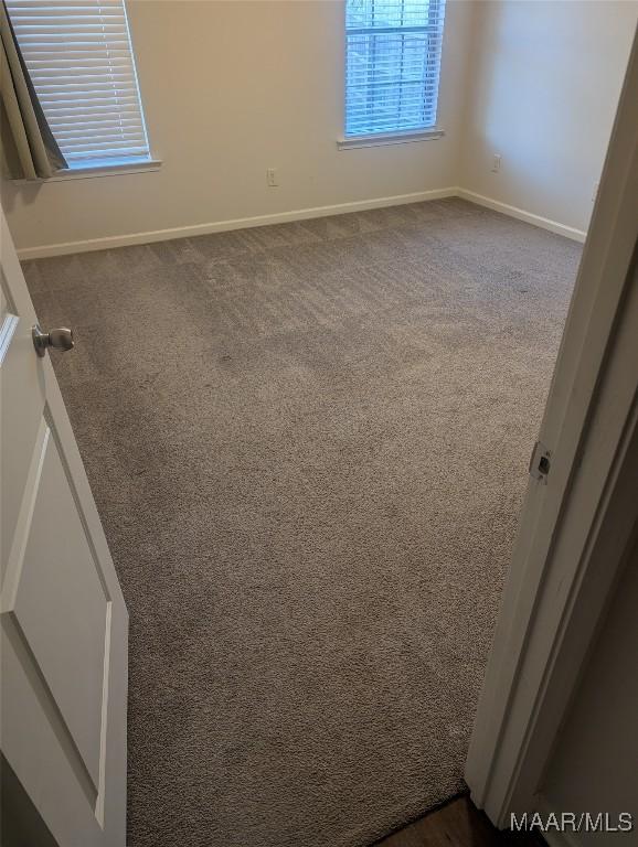 view of carpeted spare room