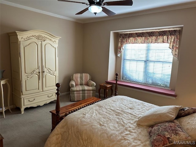 carpeted bedroom featuring ceiling fan and ornamental molding