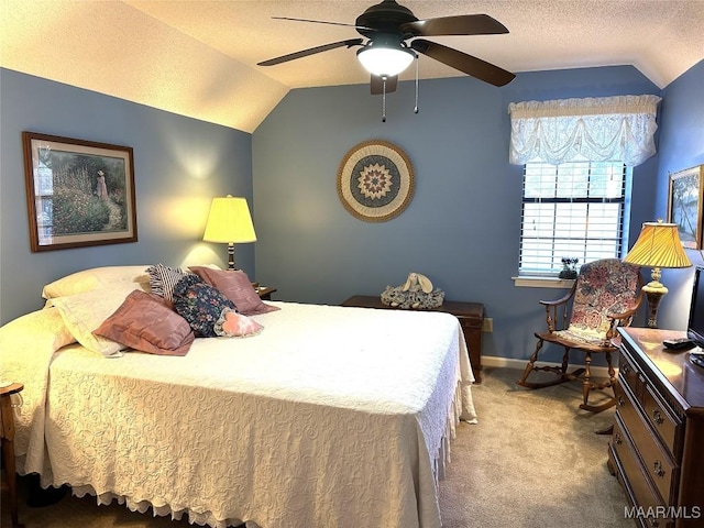 carpeted bedroom featuring ceiling fan and lofted ceiling