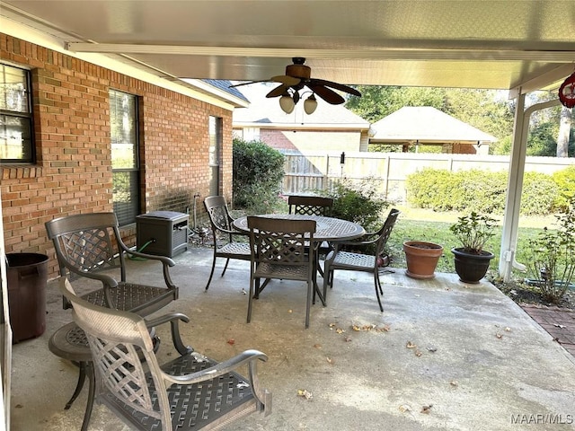 view of patio featuring ceiling fan