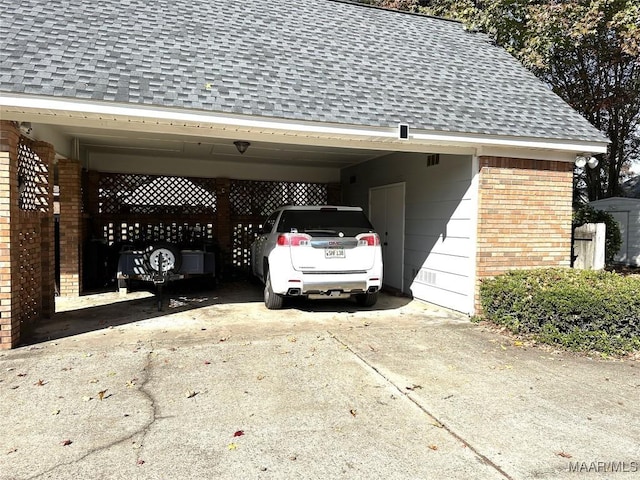 view of parking / parking lot with a carport