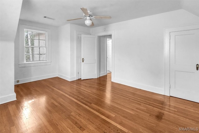 bonus room featuring ceiling fan, wood-type flooring, and vaulted ceiling