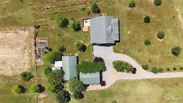 birds eye view of property featuring a rural view