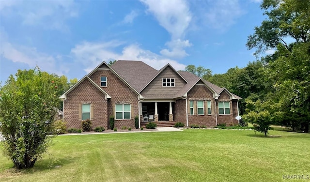 craftsman house with a front lawn