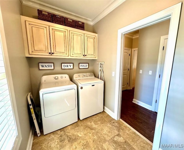 laundry area with washer and dryer, light hardwood / wood-style flooring, cabinets, and crown molding