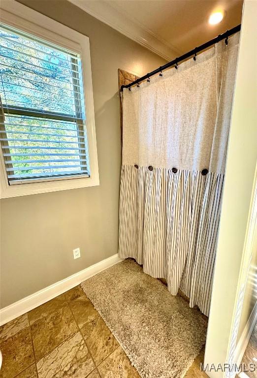 bathroom with crown molding