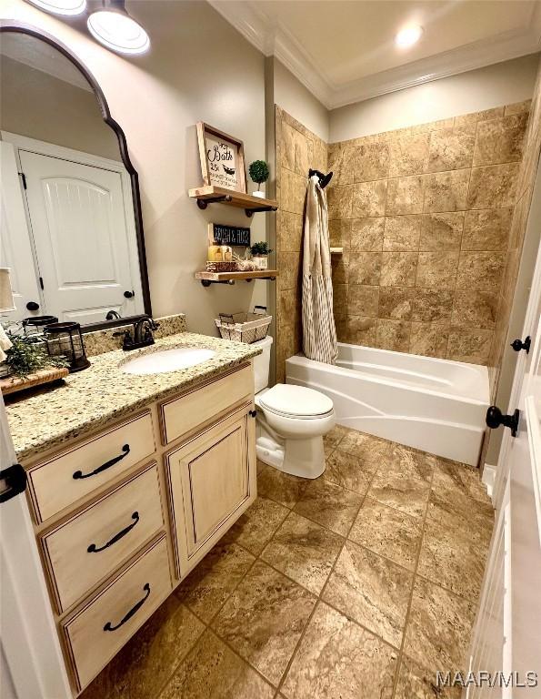 full bathroom featuring vanity, shower / bath combination with curtain, toilet, and ornamental molding